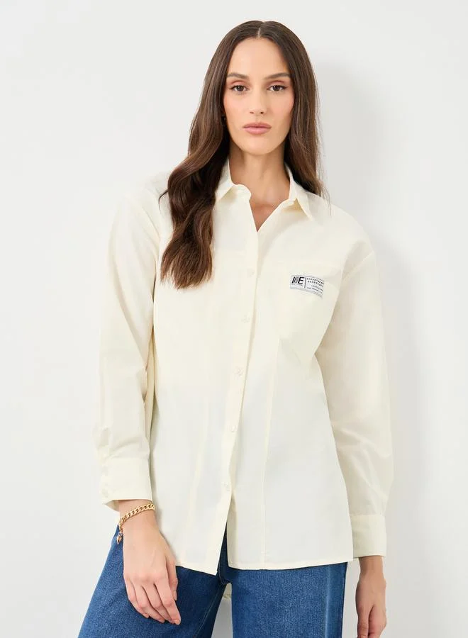 ستايلي Styli Women Cream High-Low Hem Shirt with Patch Detail