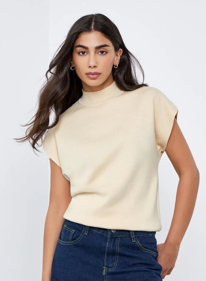 ستايلي بلوزة محبوكة بأكمام قصيرة