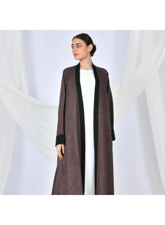 lamha abaya A brown quarter-length wrap abaya with a patterned summer jacquard fabric and black overlay on the sleeves and sides of the abaya.