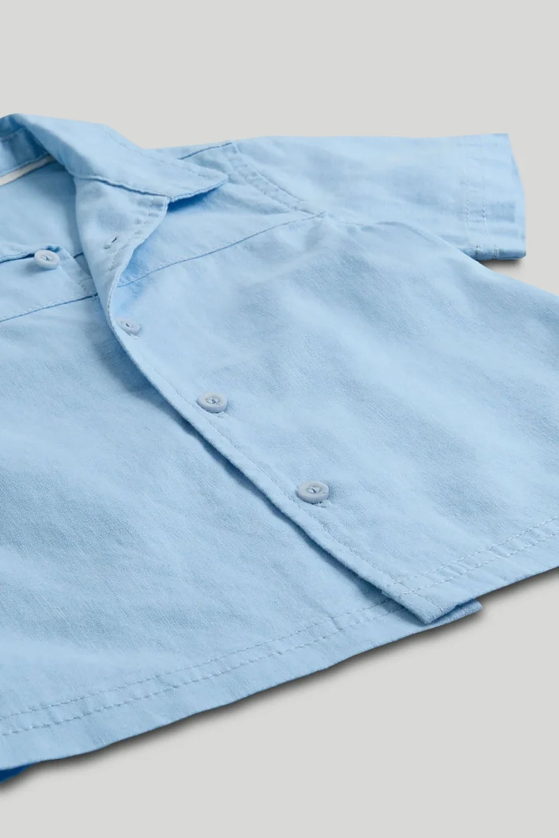 مذركير قميص كتان أزرق