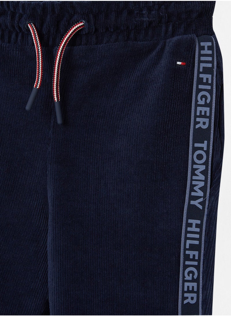 TOMMY HILFIGER - Corduroy Velour Logo Tape Joggers - Image 1