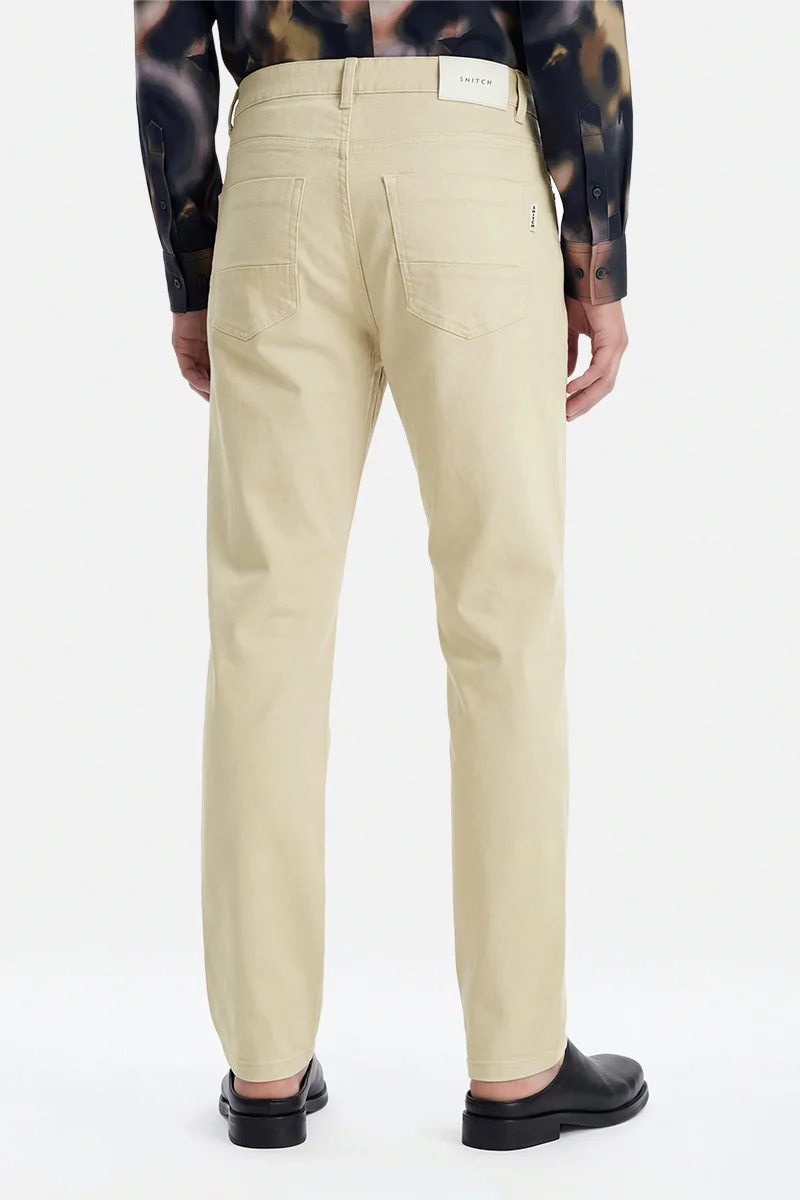 SNITCH Beige Beige Solid Regular Fit Casual Trousers for Men | Best Price UAE