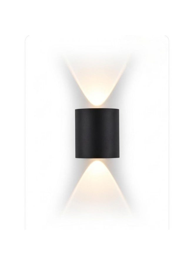 Modern Cylindrical LED Wall Sconce, Bi-Directional Up Down Light, Matte Black Metal - Image 1