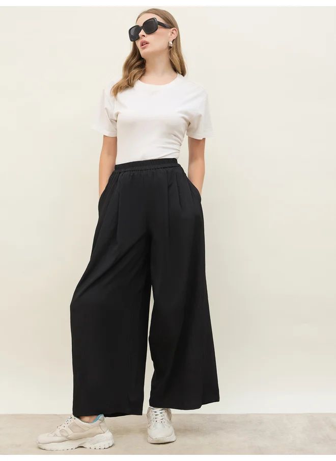 Styli Styli Solid Mid Rise Wide Leg Pants