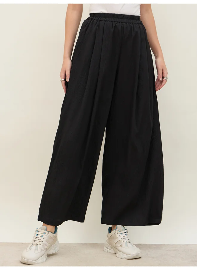 Styli Styli Solid Mid Rise Wide Leg Pants
