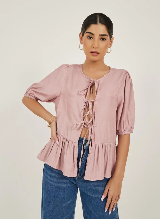 Styli Styli Puff Sleeves Ruffled Hem Peplum Top With Tie-Up Detail