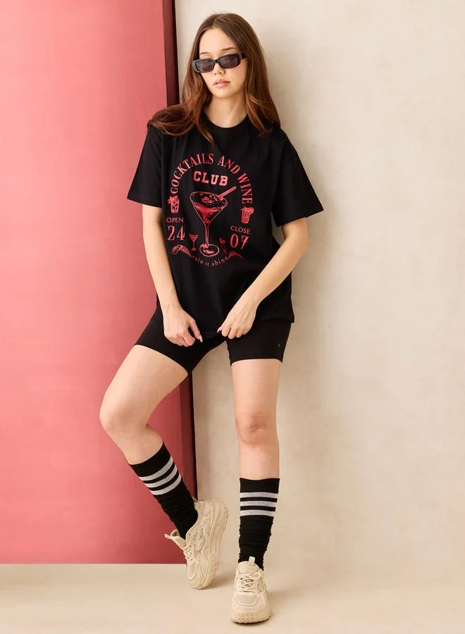 OUTZIDR Black Graphic Oversized T-Shirt