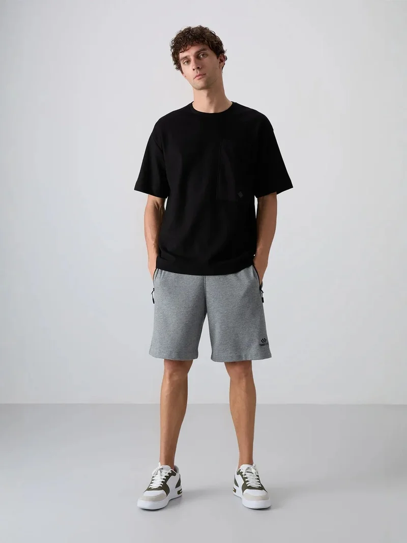تومي لايف TOMMY Oversized Cotton-Blend Crew Neck T-Shirt With Pocket