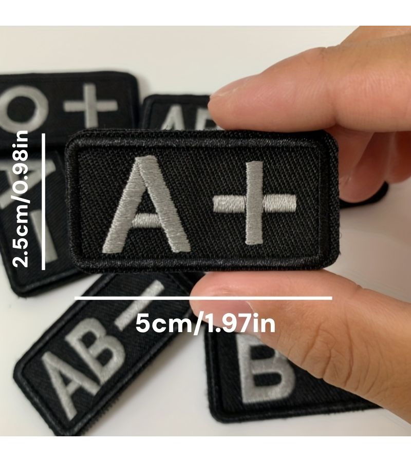 رقعة فصيلة الدم شارة طبية هوك ولووب سوداء مكتوب عليها A+، B+، O+، AB+ للسجلات الطبية، التبرع بالدم، الإسعافات الأولية، على المعطف وحقيبة الظهر، الطراز 7 - Image 1