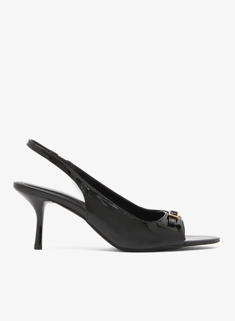 ترافل من نمشي صنادل بكعب متوسط مفتوحة من الأمام بحزام خلفي لامع