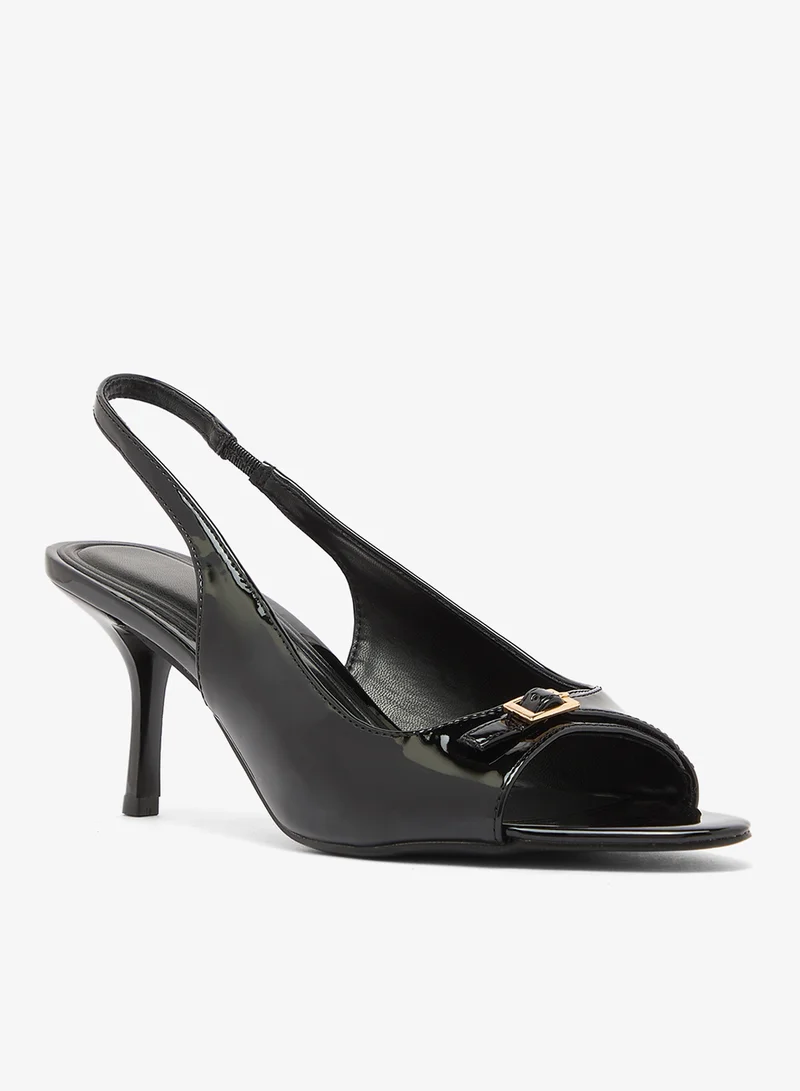 ترافل من نمشي صنادل بكعب متوسط مفتوحة من الأمام بحزام خلفي لامع