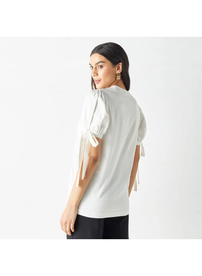 Iconic Iconic Printed Top with Puff Sleeves and Tie-Ups