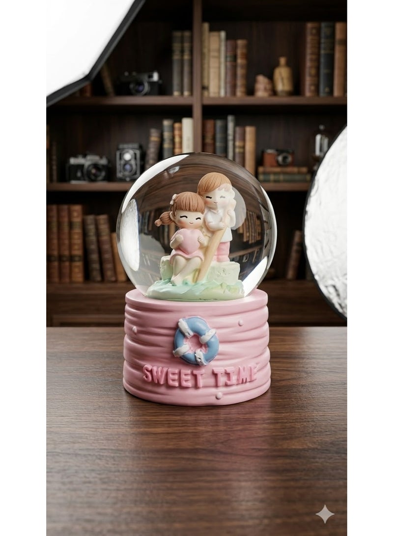 A light-up snow globe glass crystal with a "love" design, cartoon characters, and a decorative base - a perfect gift for any occasion with lights.