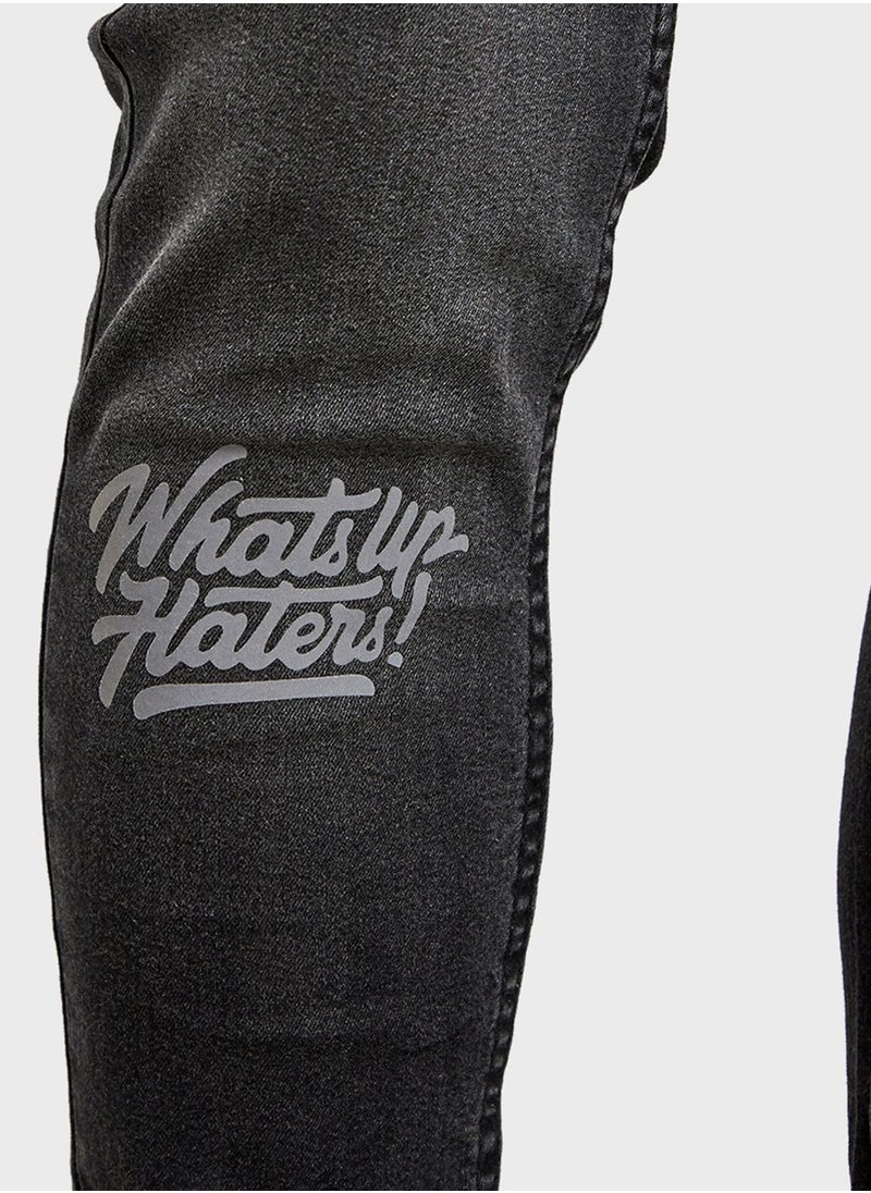 Styli - Reflective Sticker Print Washed Skinny Denim - Image 1