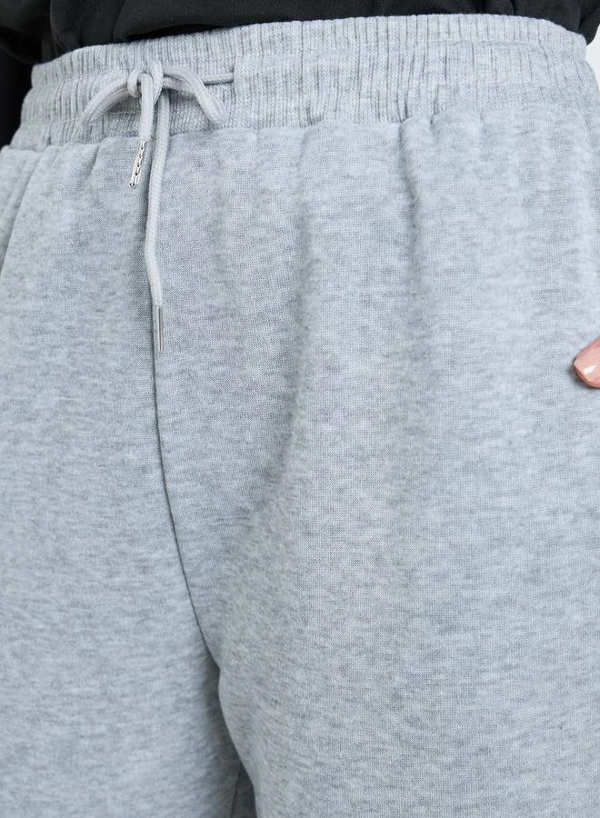 Styli  Solid Cuffed Wide Leg Joggers for Women | Best Price UAE