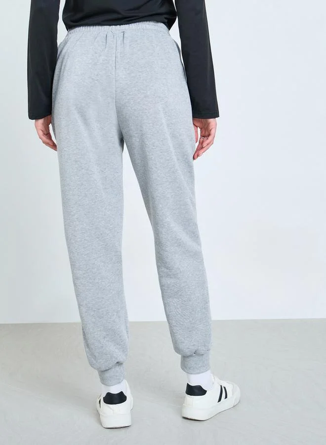 Styli  Solid Cuffed Wide Leg Joggers for Women | Best Price UAE
