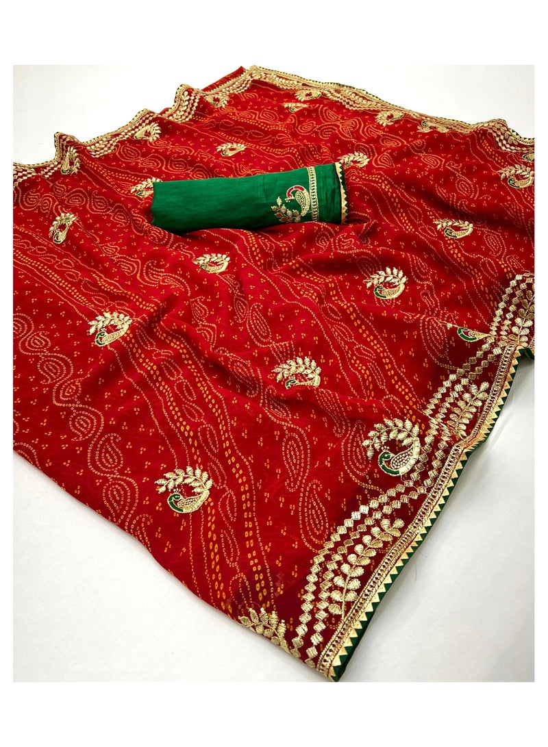 جــرابــمـــا نــتــرا   Red Bandhani Print Georgette Sari With Gotta Patti Work Design Border All Over Plus Green Unstitched Blouse