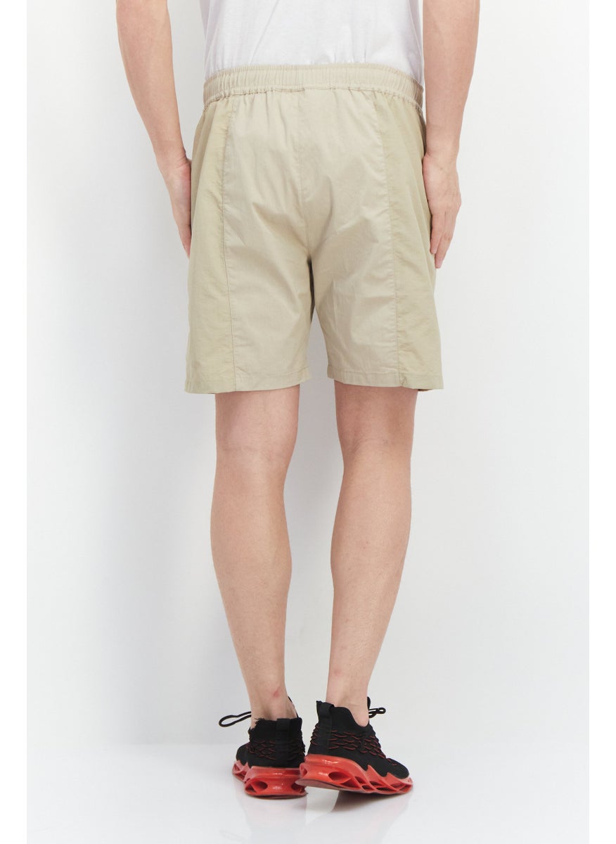 FILA Men Sportswear Fit Drawstring Titling Outdoor Short, Beige  - Image 3