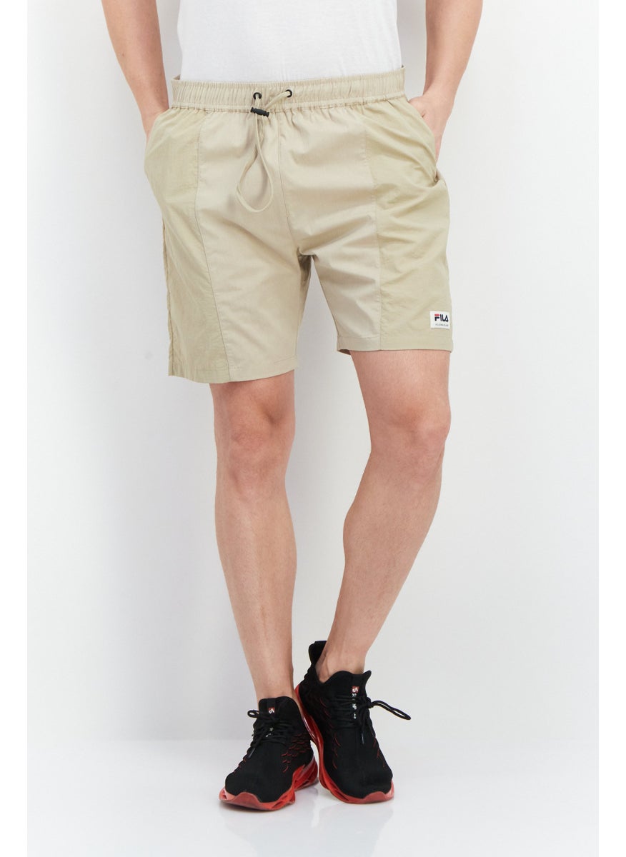 FILA Men Sportswear Fit Drawstring Titling Outdoor Short, Beige  - Image 1