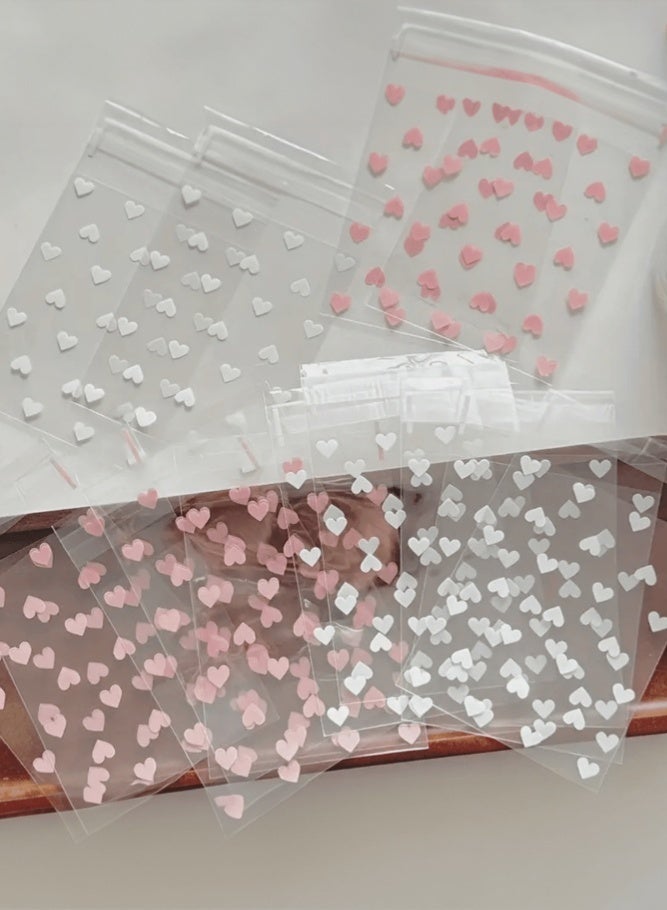 MAIDI 100pcs Resealable Cookie Snack Cellophane Bags, Plastic Bags for Baking Cookies and Candies (10x8 cm)Pink & White Heart Frosted OPP Self-Adhesive Bags, Food-Grade Sealing Bags ,Cute Girly Party Favor Packaging Pouches - Image 4