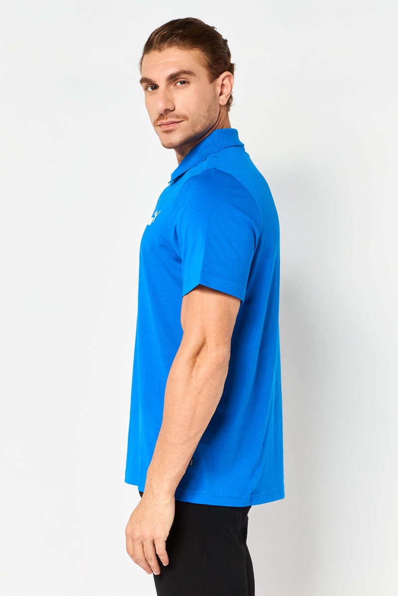 PUMA تي شيرت بولو للرجال بأكمام قصيرة لياقة رياضية بشعار العلامة التجارية، أزرق - Image 2