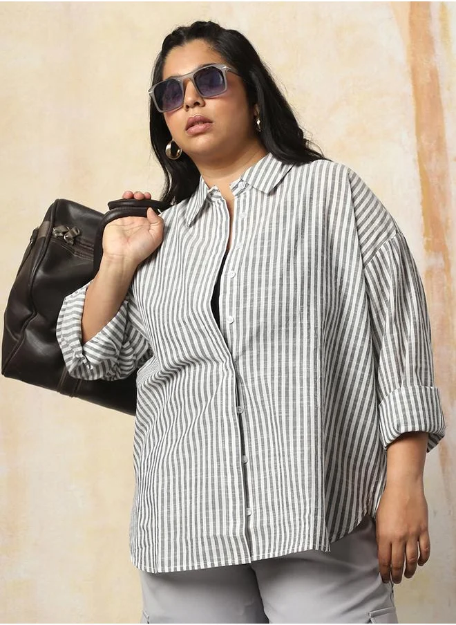 هاي ستار Women Shirts in Black featuring Oversized fit with a strip pattern, spread collar collar, collar neckline, full sleeve, secured with button closure, crafted from 100% cotton – a wardrobe staple for modern fashion enthusiasts.