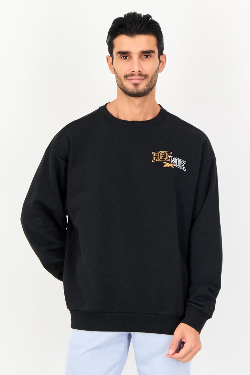 Reebok Men Sportswear Fit Long Sleeve Outdoor Sweatshirt, Black - Image 1