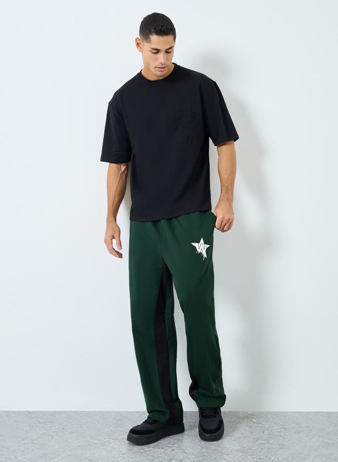 ستايلي بنطال جوغر واسع بطبعة جرافيك - Image 2