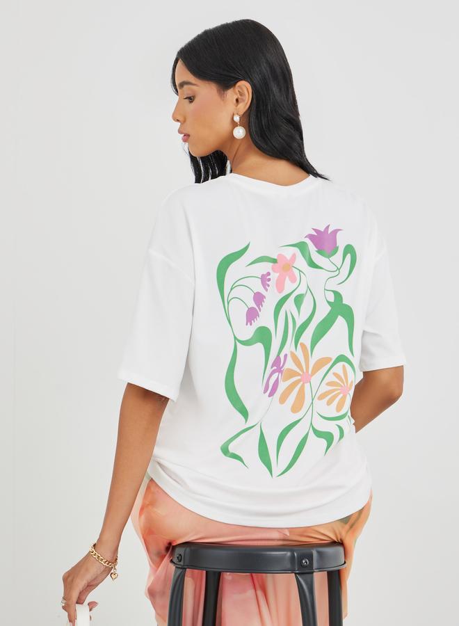 تايك تو تيشيرت فضفاض بياقة دائرية وطبعة جرافيك - Image 1