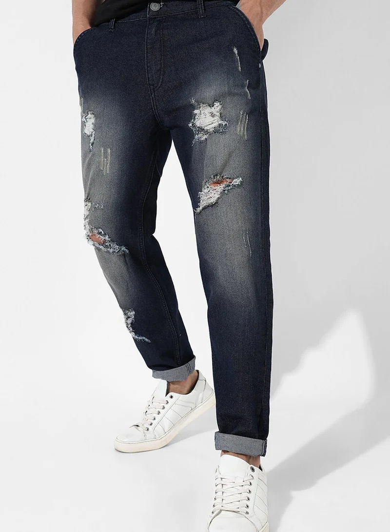 Campus Sutra Campus Sutra Men's Dark Blue Ripped Dark-Wash Denim Jeans | Stretchable Cotton Mid-Rise Denim Jeans Crafted With Comfort Fit and High Performance For Everyday Wear