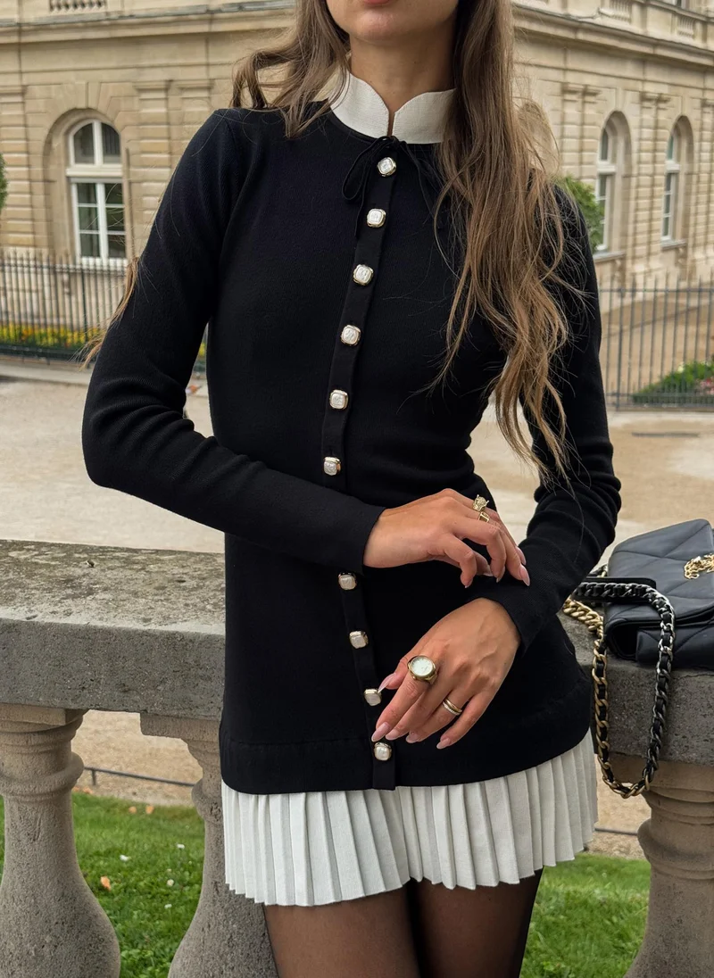 Jersey mini dress with contrasting pleated skirt