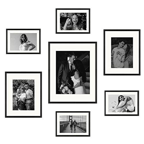 Frametory Black Aluminum Picture Frame with Removable Mat  Set of 7 Includes Four 5x7 Two 8x10 One 11x14  Real Glass Front  Simple Gallery Wall Frames for Art Prints and Posters