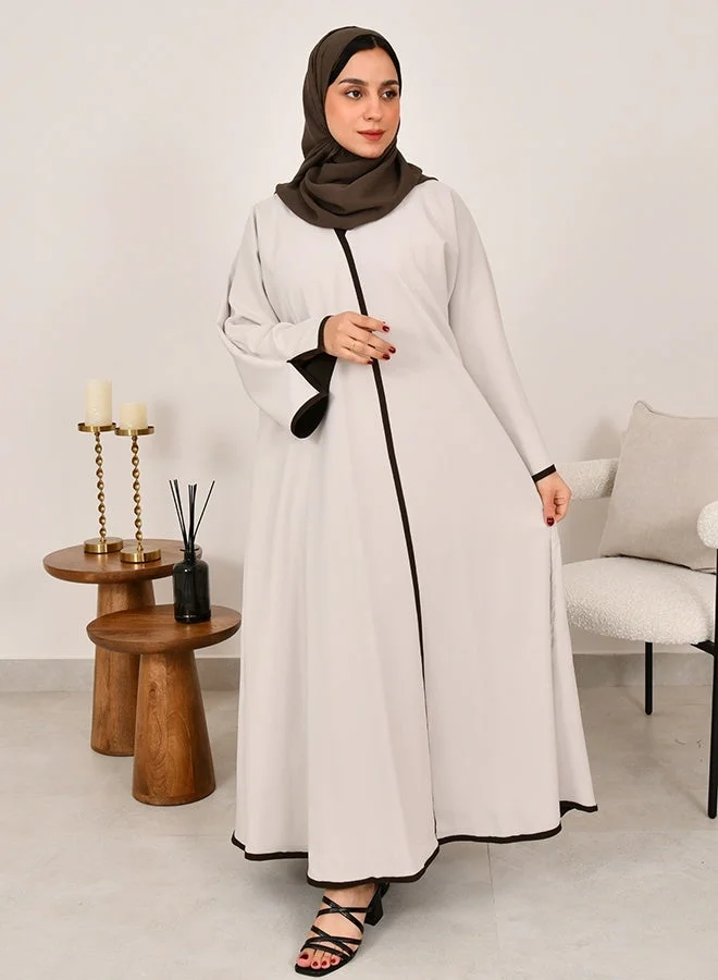 HAWRAA ABAYA Double-faced wrap abaya in off-white and dark brown
