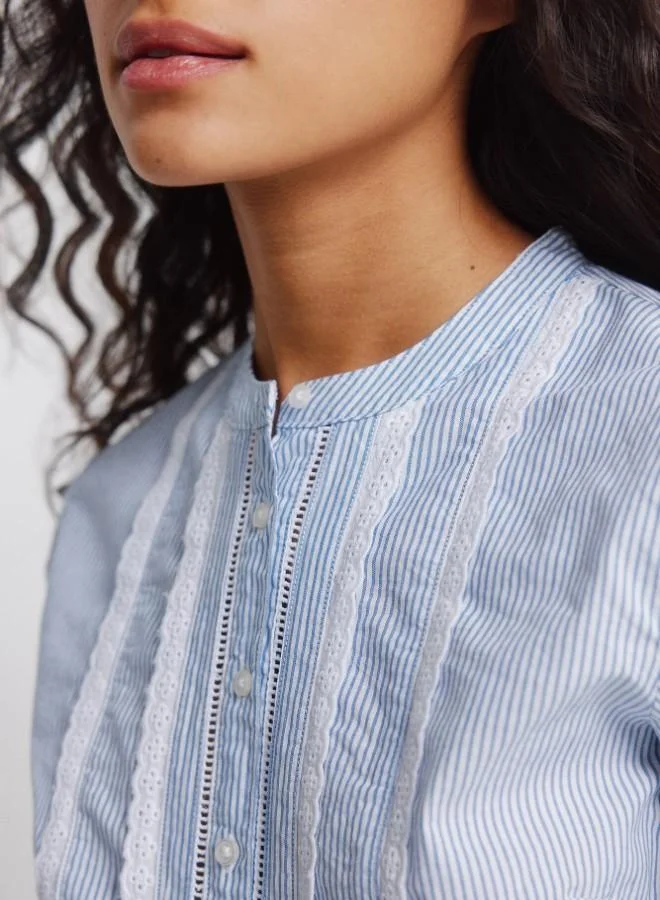 Springfield  Long sleeve shirt with volume, with mandarin collar, with button fastening, with lace detail on the front and cuffs. for Women | Best Price UAE
