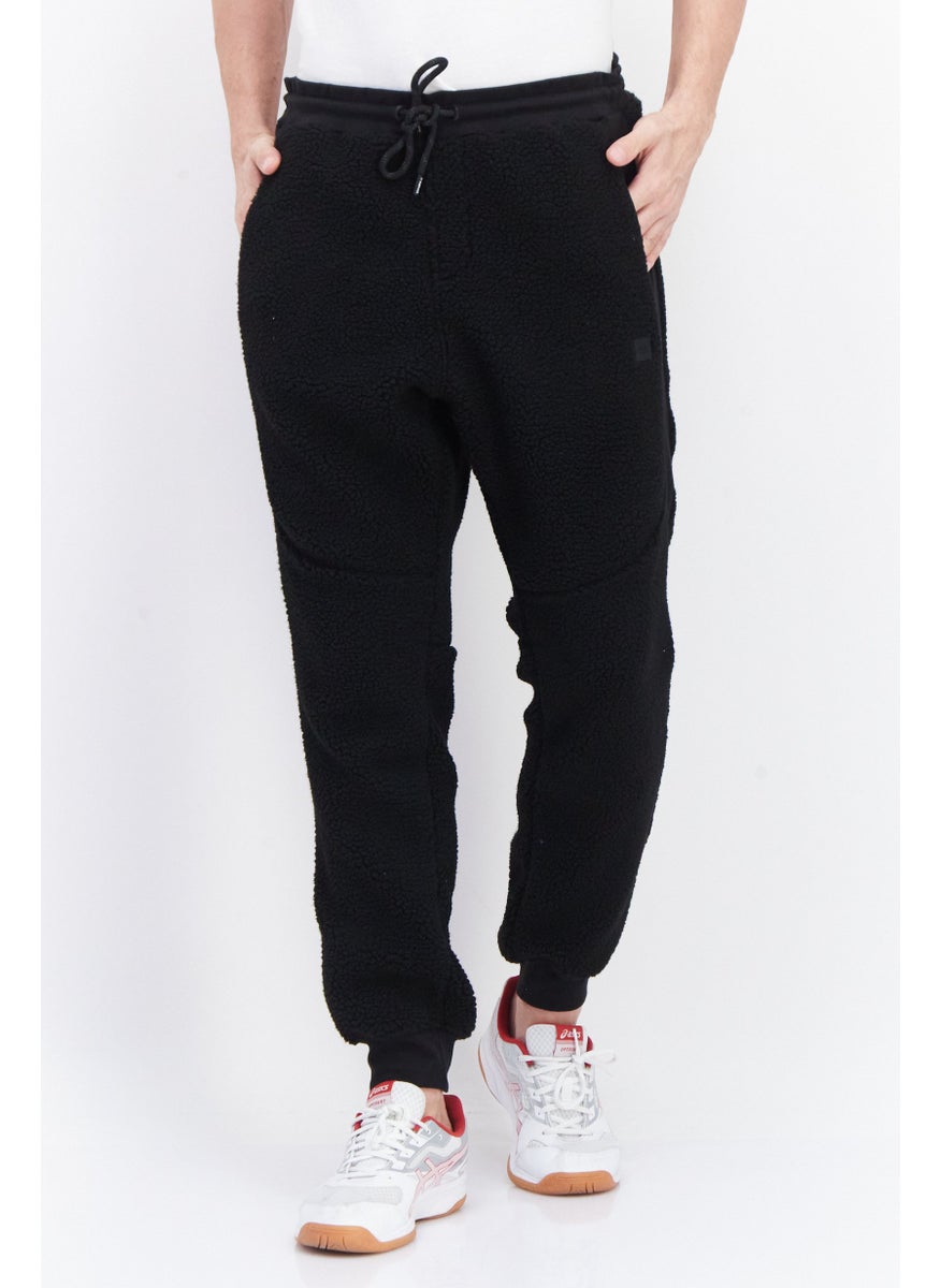 Men Regular Fit Textured Sweatpants, Black - pzsku/ZD51E704A3257DD7D28EDZ/45/_/1737728343/62ad1be1-4ccc-4262-9c7a-a104e5cee39b