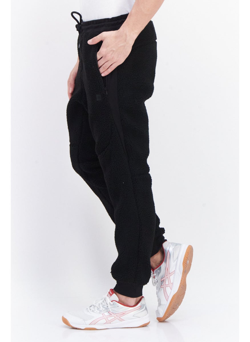 Men Regular Fit Textured Sweatpants, Black - pzsku/ZD51E704A3257DD7D28EDZ/45/_/1737728345/b2ac0985-5742-403c-b13e-e4e5907244d3