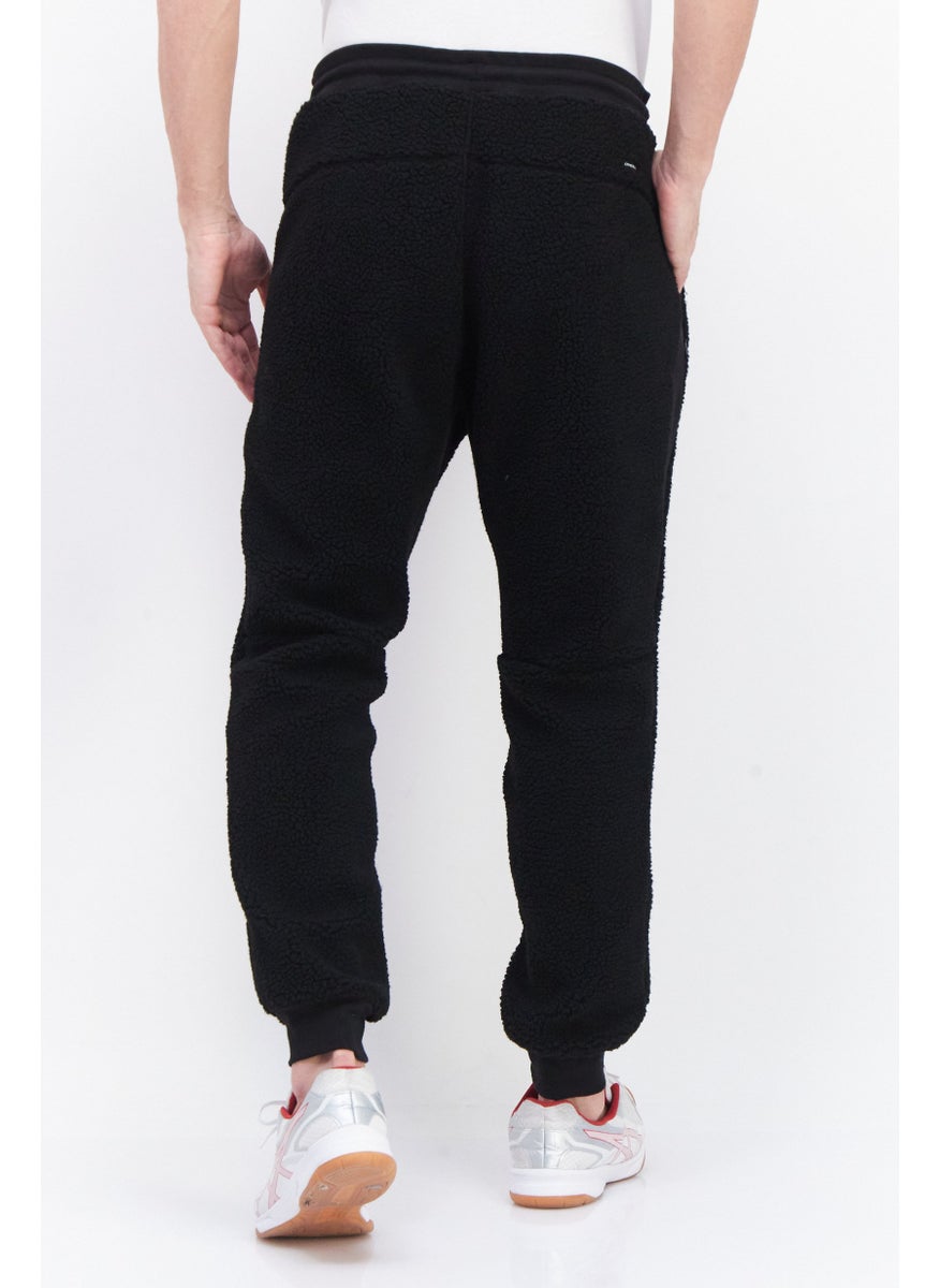 Men Regular Fit Textured Sweatpants, Black - pzsku/ZD51E704A3257DD7D28EDZ/45/_/1739715392/49ba0eec-950d-47bd-a62b-1daeaeedec1b