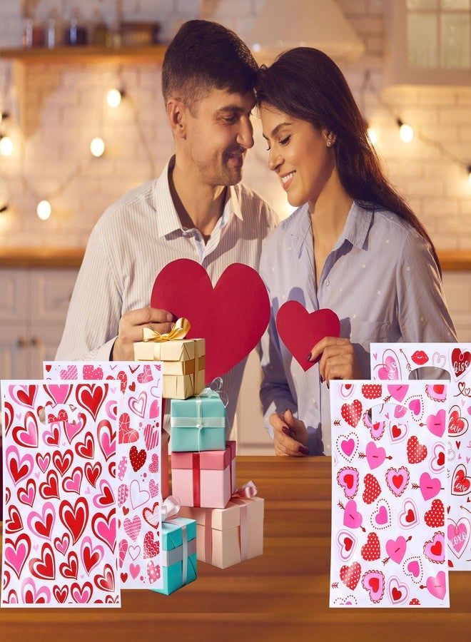 FUULOXE 100 Pcs Valentine's Day Gift Bags with Handles, Heart Plastic Treat Bags for Party Favors, Candy, and Gift Exchange - Image 4