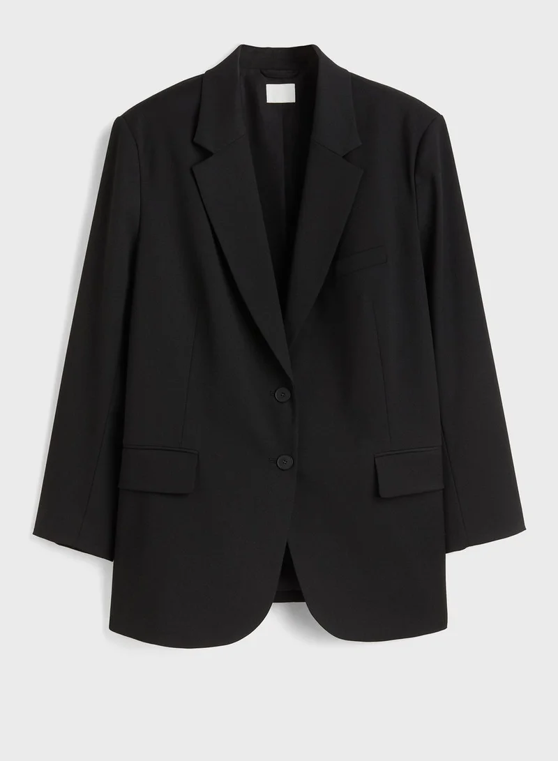 اتش اند ام بليزر واسع بقصة مفصلة وجيوب