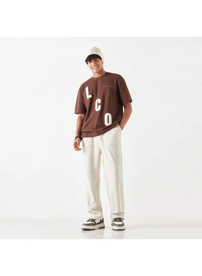 Lee Cooper Lee Cooper Printed Oversized T-Shirt with Crew Neck and Short Sleeves