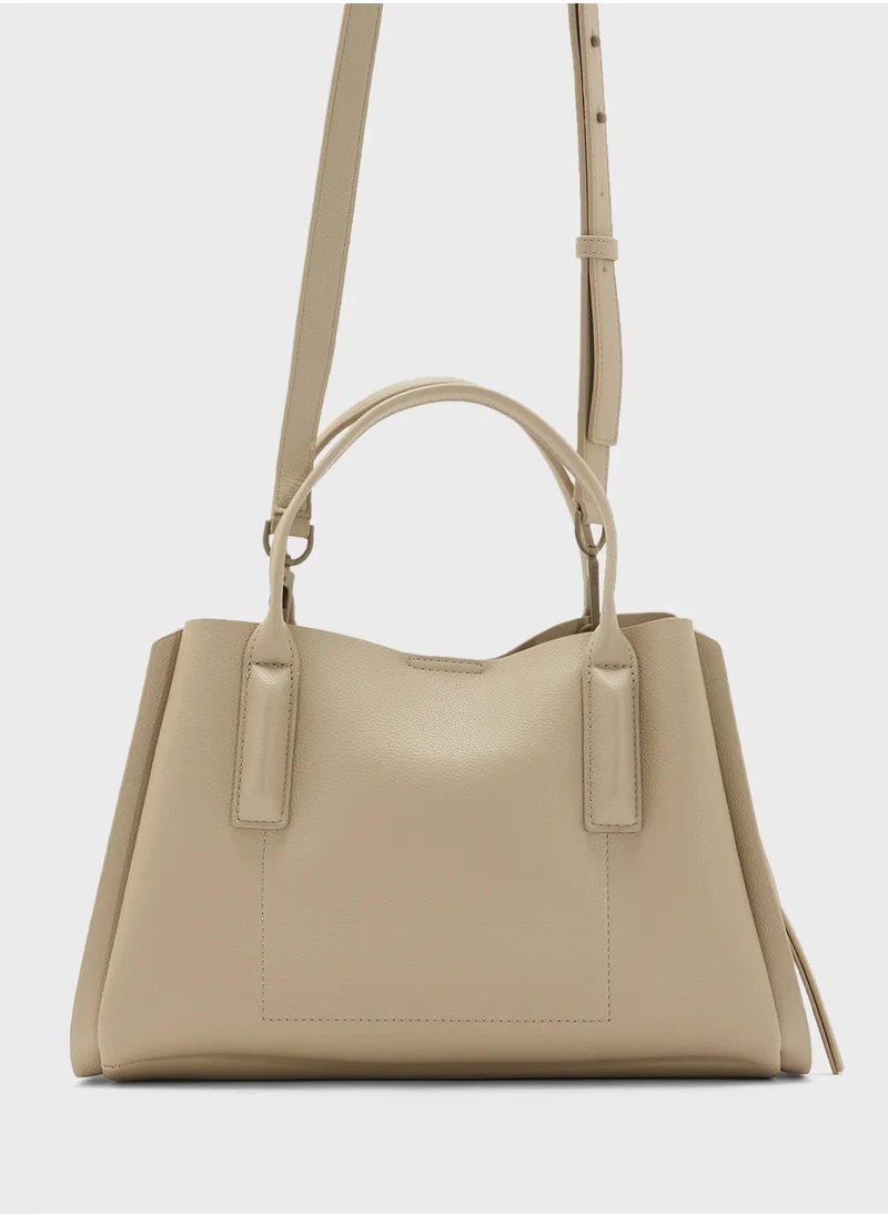 دكني Logo Josie Satchel