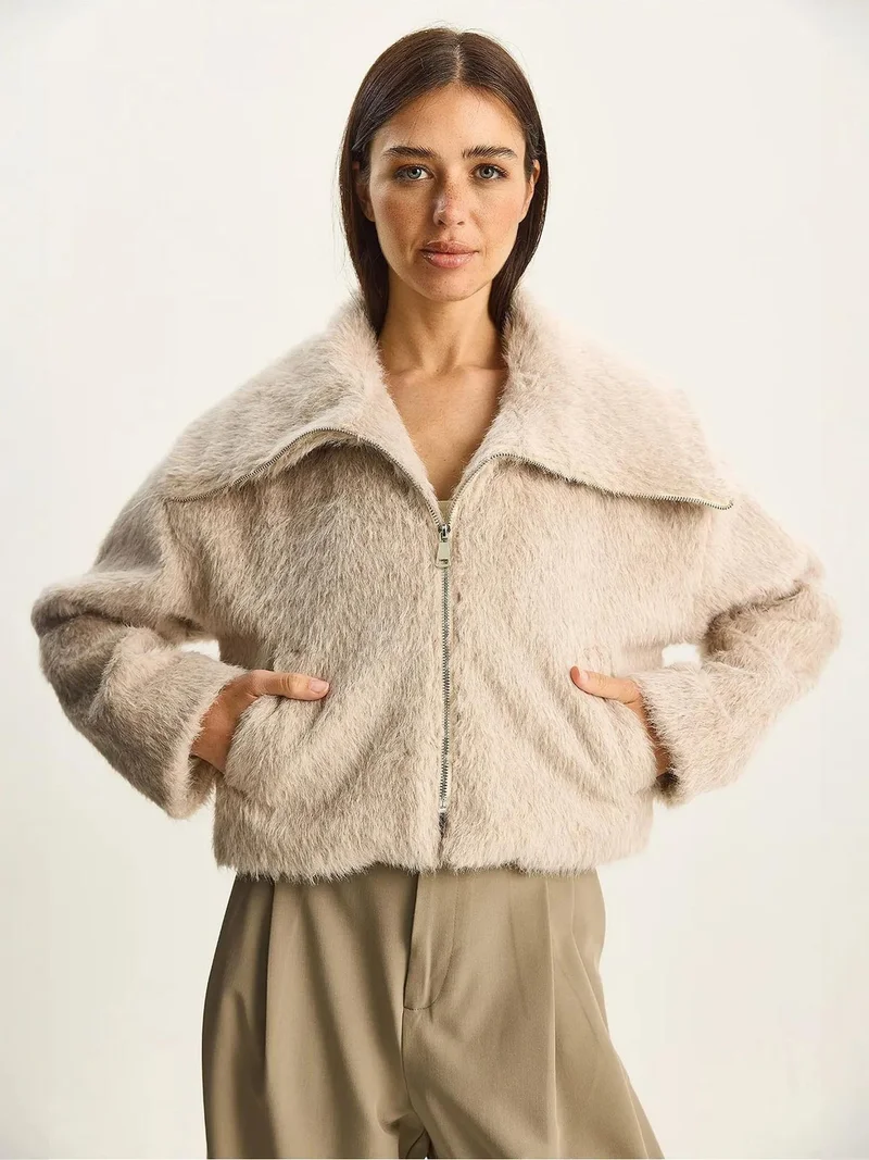 Bianco Lucci Beige Natural LUCCI Textured Plush Bomber with Zipper Closure for Women | Best Price UAE