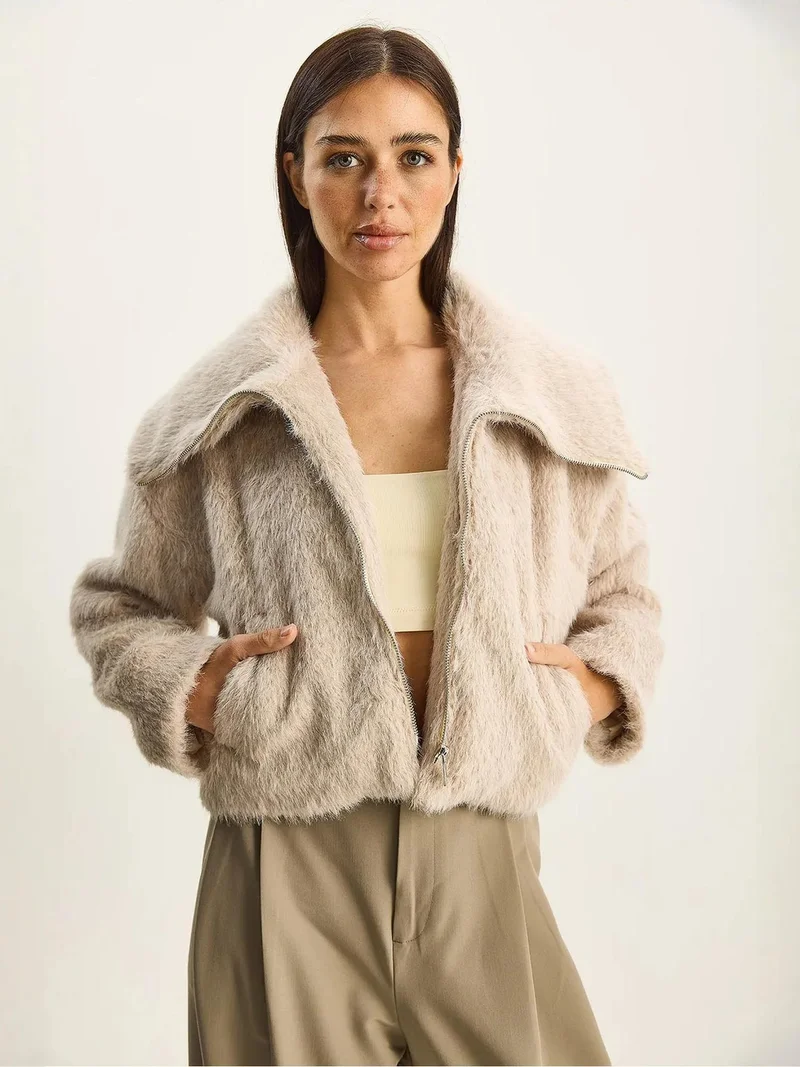 Bianco Lucci Beige Natural LUCCI Textured Plush Bomber with Zipper Closure for Women | Best Price UAE
