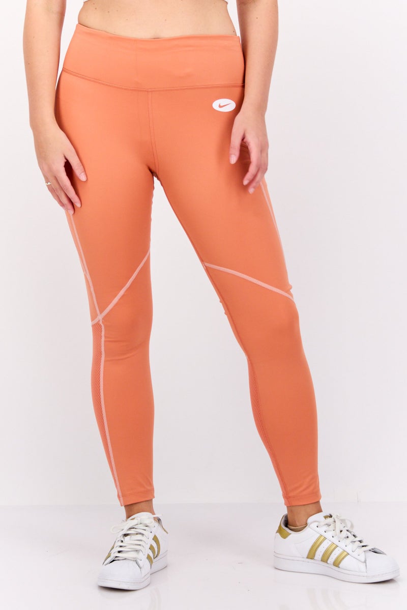 Nike Women Sportswear Fit Brand Logo Training Leggings, Coral - Image 1