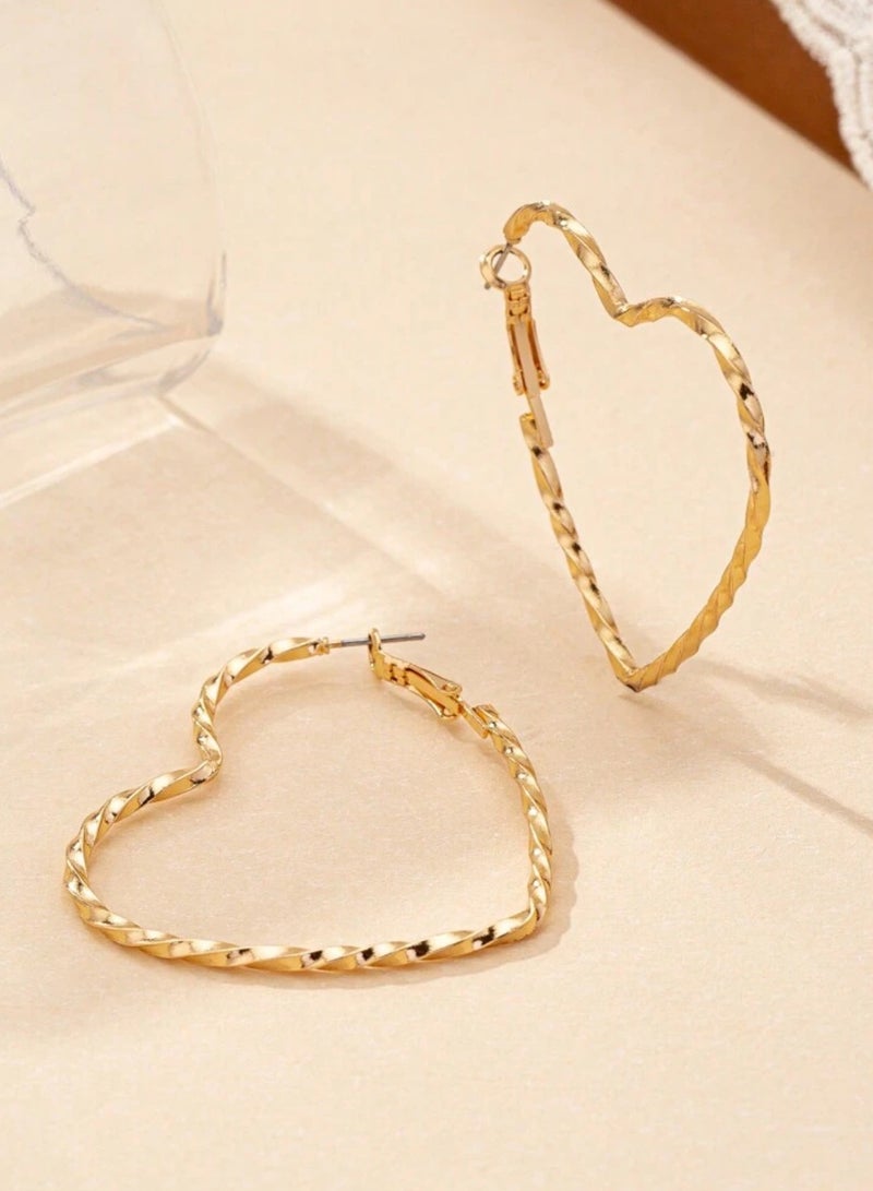 إيكوال حلق اذن نسائي دائري من الاستانلس ستيل أنيق وعالي الجودة باللون الذهبي - Image 2