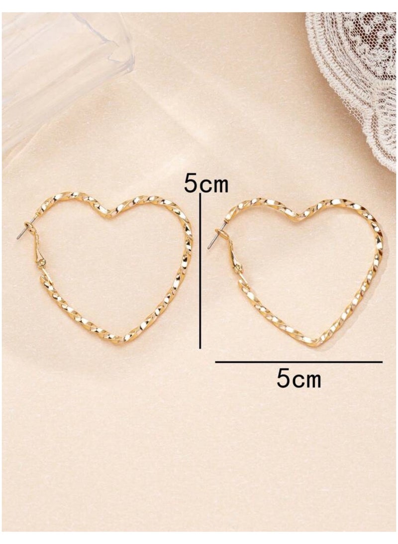 إيكوال حلق اذن نسائي دائري من الاستانلس ستيل أنيق وعالي الجودة باللون الذهبي - Image 3