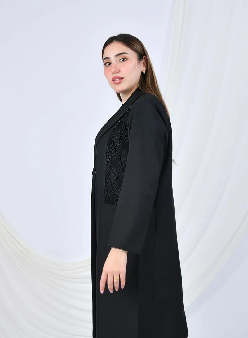 HAWRAA ABAYA Luxury padded blazer with shoulder pads, featuring bright jacquard fabric and front buttons.