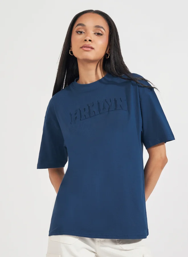 Styli Styli Oversized Embossed Print Cotton Jersey T-Shirt