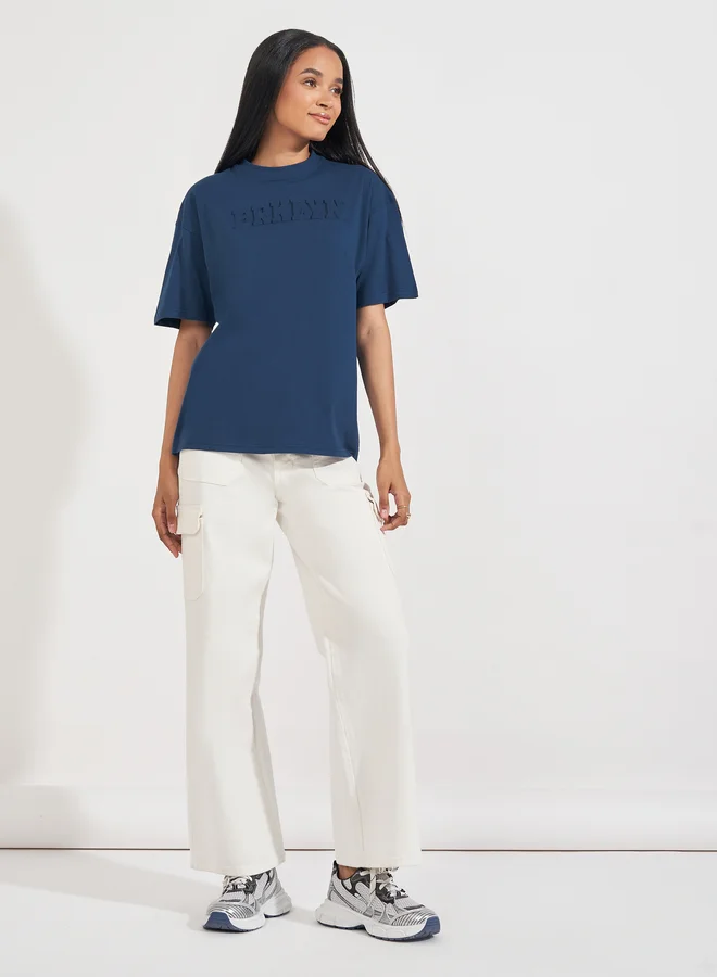 Styli Styli Oversized Embossed Print Cotton Jersey T-Shirt