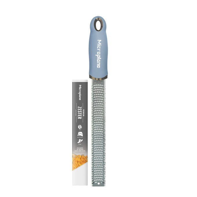ZESTER GRATER IN SKY BLUE FOR CITRUS FRUITS HARD CHEESE GINGER CHOCOLATE AND NUTMEG WITH FINE STAINLESS STEEL BLADE MADE IN USA